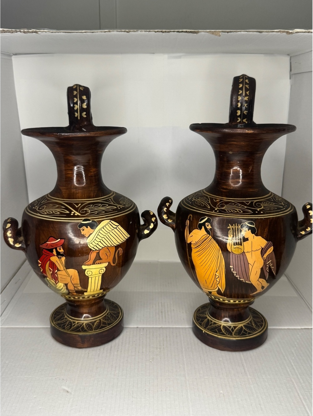 Pair of Greek style decorative ewers